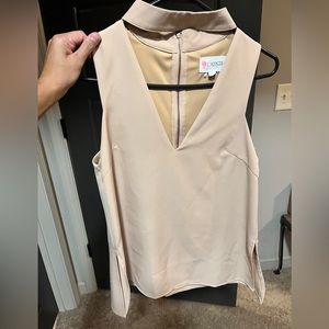Tan colored top size small